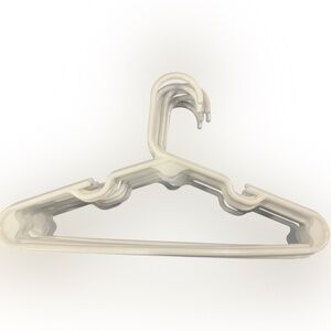 Lot of 65 children’s size plastic hangers. Variety